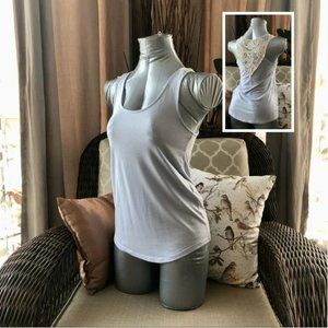 Pale Lavendar Camisole with a BOHO detail in the back.